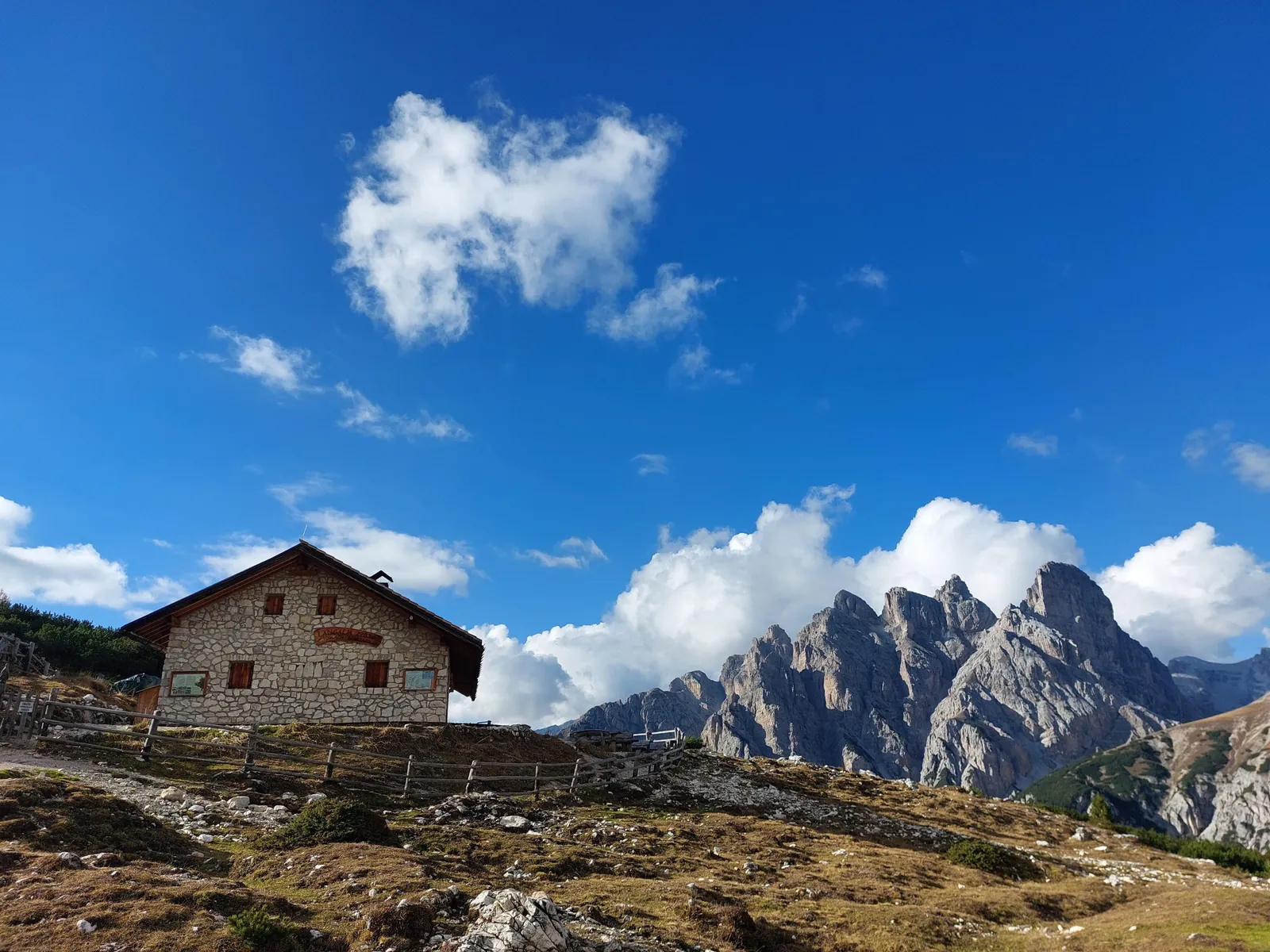 Mountain hut on the Tre Cime loop with the Cadini beyond
