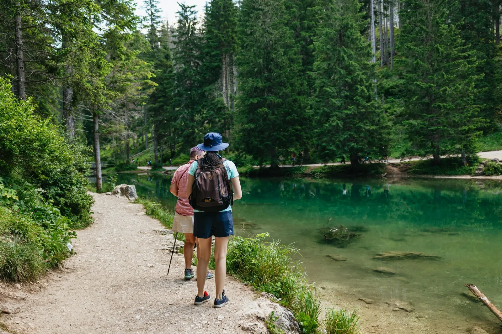 Shoreline path around the emerald water of Lago di Braies