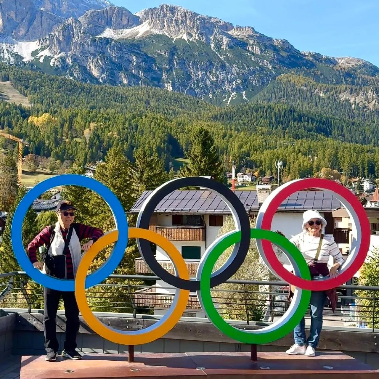 Private tour guests at the Olympic rings in Cortina