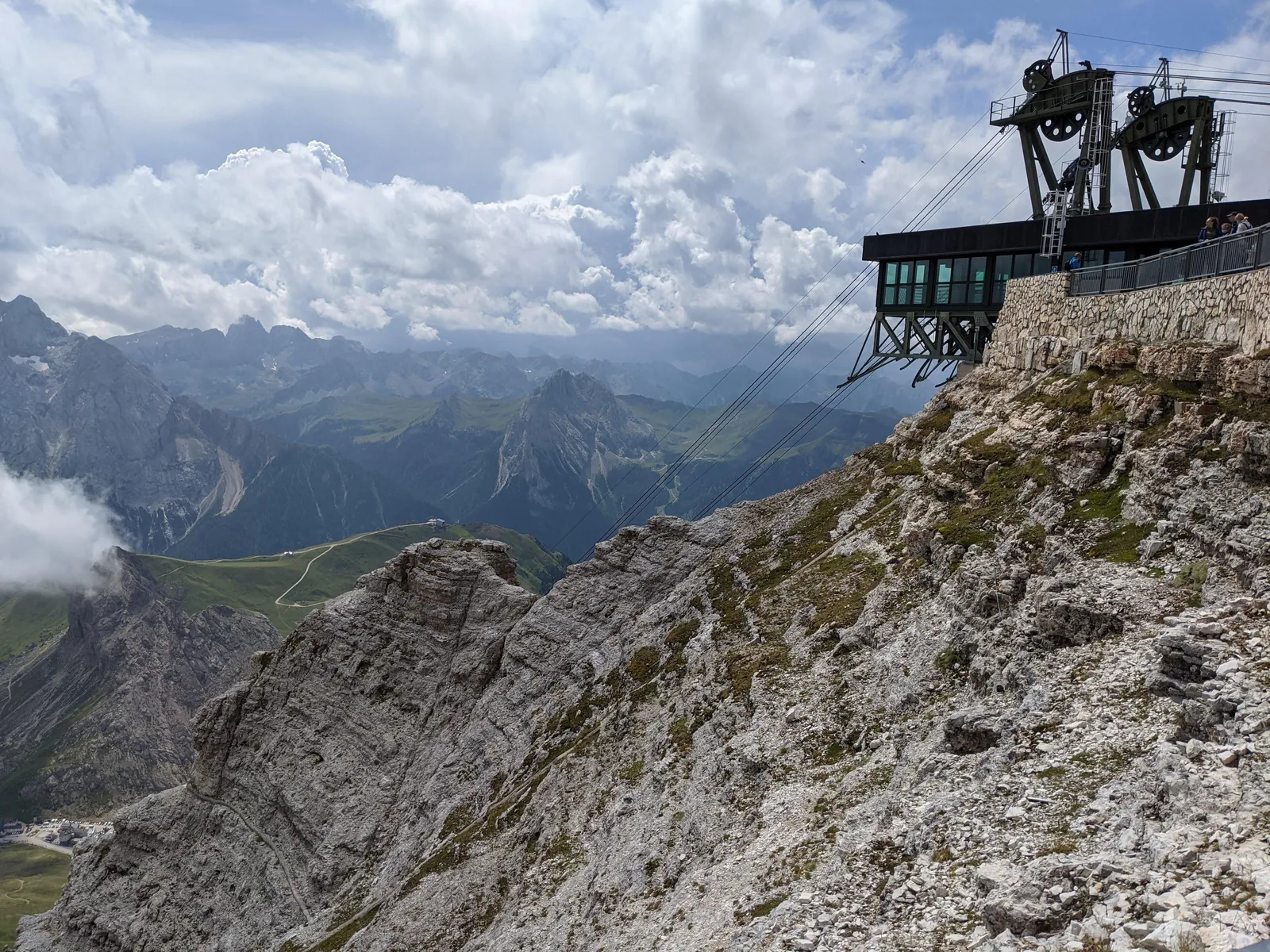 Top station of the Sass Pordoi cable car on the cliff edge