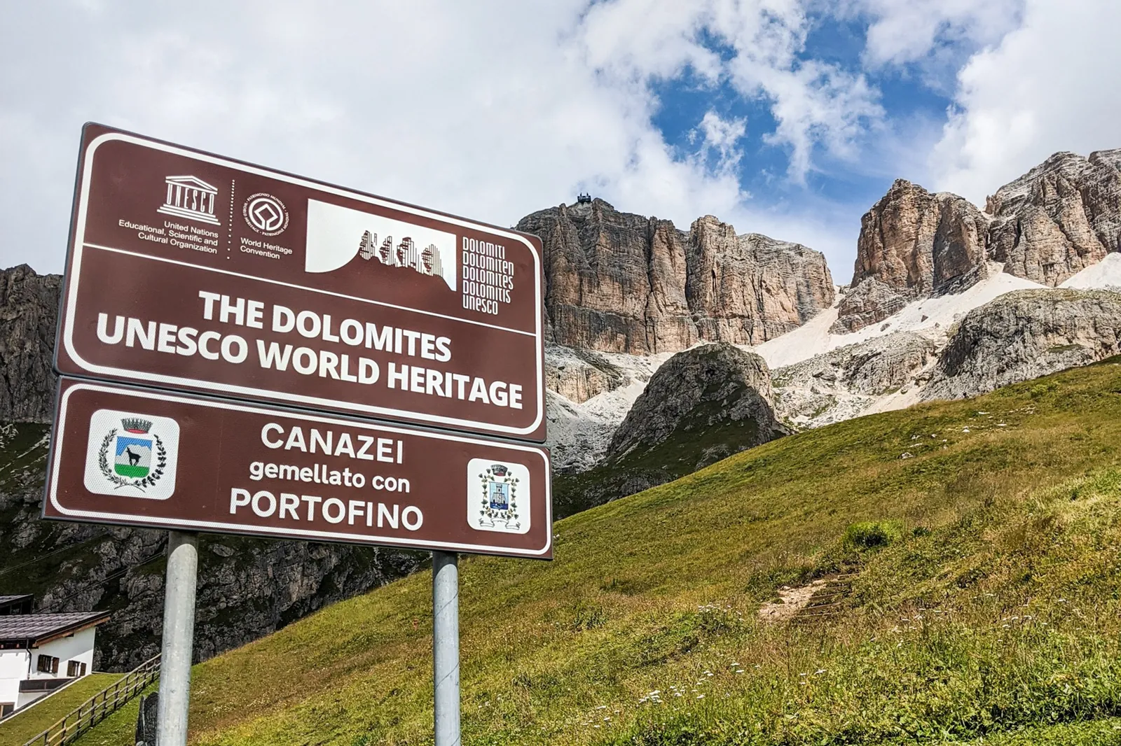 UNESCO World Heritage sign at Canazei in Val di Fassa