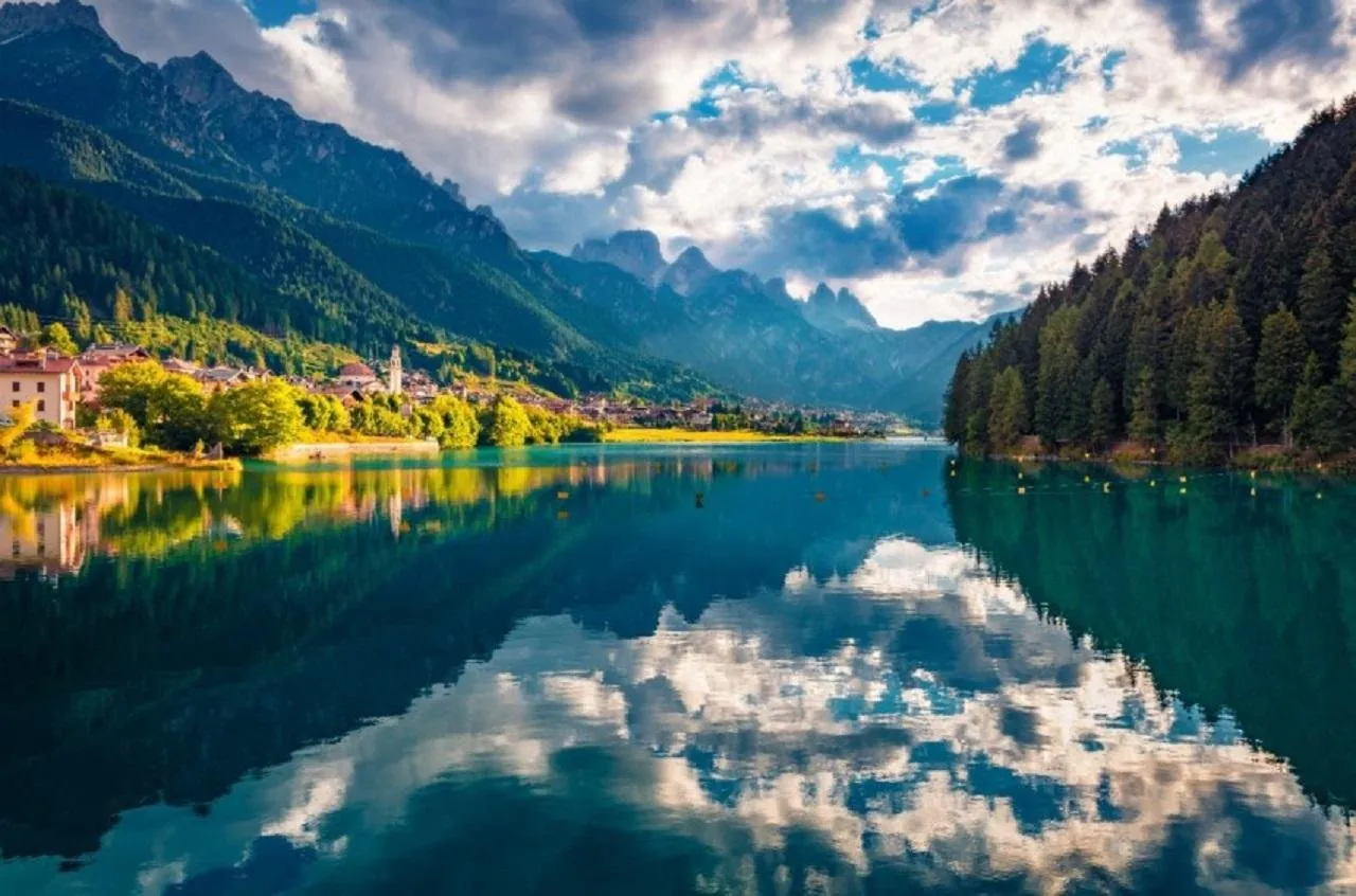 Lake Santa Caterina at Auronzo in still morning reflection