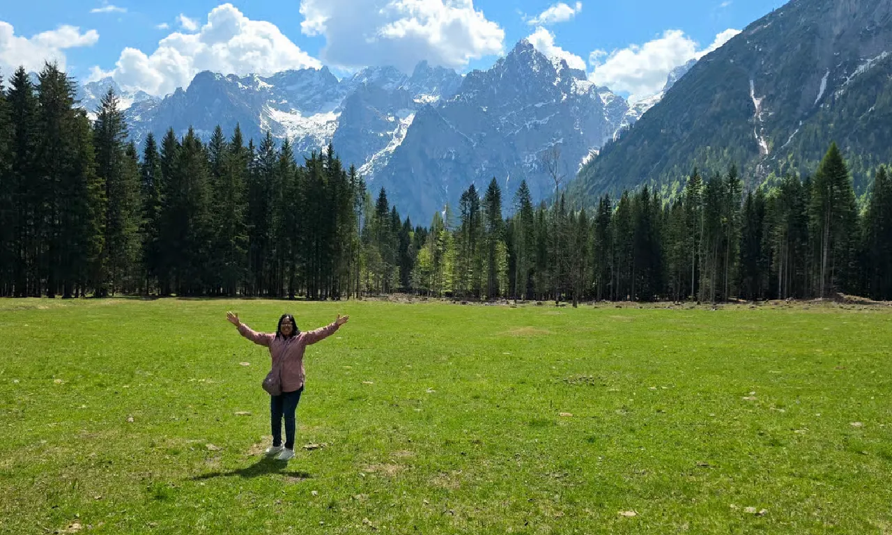 Meadow beside Lake Misurina with the Cadini peaks behind